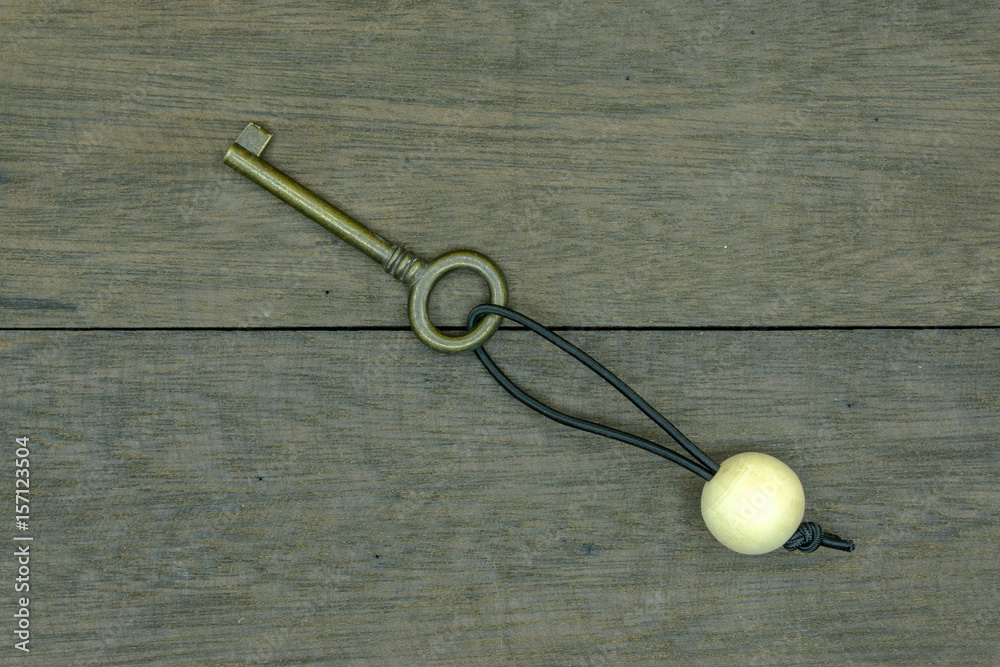 old key on a wooden background