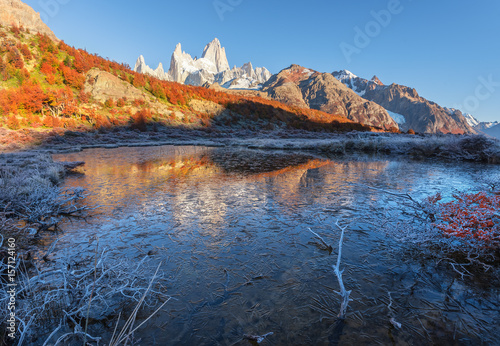 The frozen reflection of the Monte Fitz Roy (Cerro Chalte) - the peak located in Patagonia in the border area between Argentina and Chile, the view from the trail in the National Park of Los Glaciares