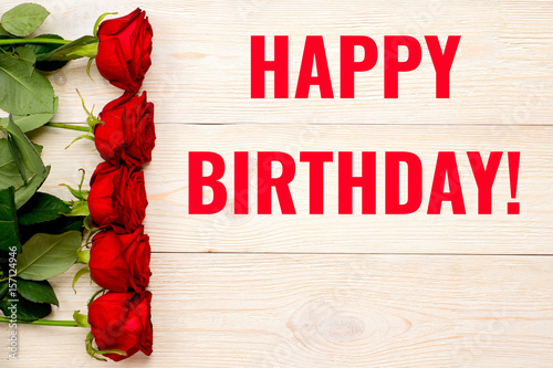 Canvas Print happy birthday greeting text on craft paper card with red roses and copy space