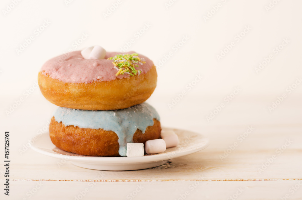Fotografie Pair of glazed donuts