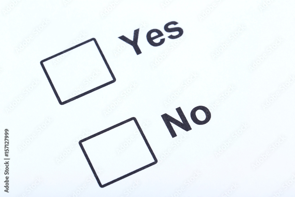 Check boxes yes and no on white paper Check boxes yes and no on white paper