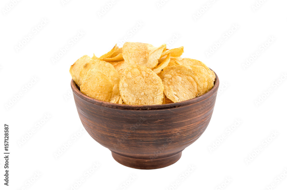 Bowl with potato chips isolated on white.