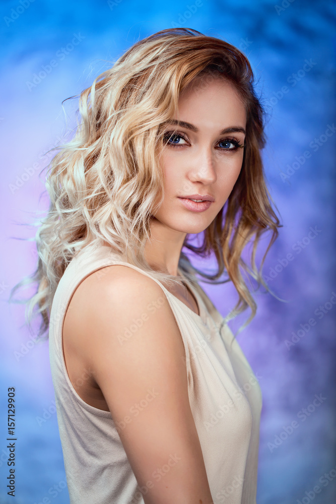 Studio portrait of a beautiful young girl with blue eyes close-up Studio portrait of a beautiful young girl with blue eyes close-up