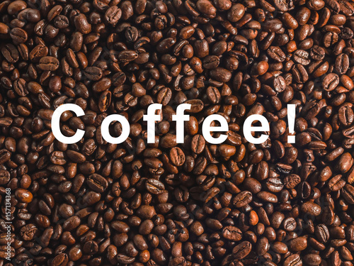 Words on background of coffee beans