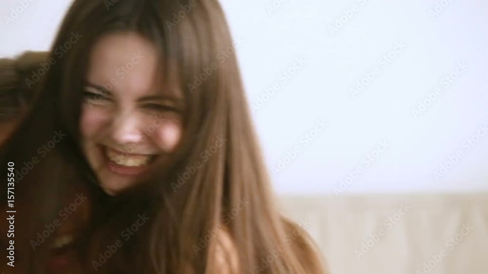 Excited teenage girls celebrating at home, screaming jumping with joy, hugging each other, feeling great happiness or excitement, emotional reaction to unexpected good news, successful exam results Excited teenage girls celebrating at home, screaming jumping with joy, hugging each other, feeling great happiness or excitement, emotional reaction to unexpected good news, successful exam results