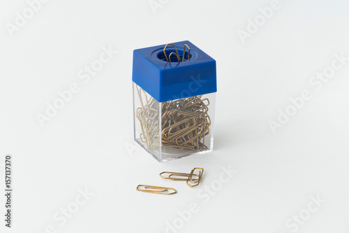 Box with office clips / Box with office paper clips isolated on white
