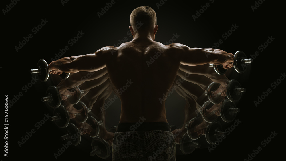 Dumbbell Lateral Raise concept Bodybuilder turning back raising hands pumping up shoulders muscle exercise Power Partials routine with dumbbells on gym Stock Photo Adobe Stock