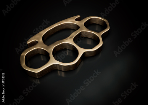 knuckle-duster with copy space on dark background 3d illustration