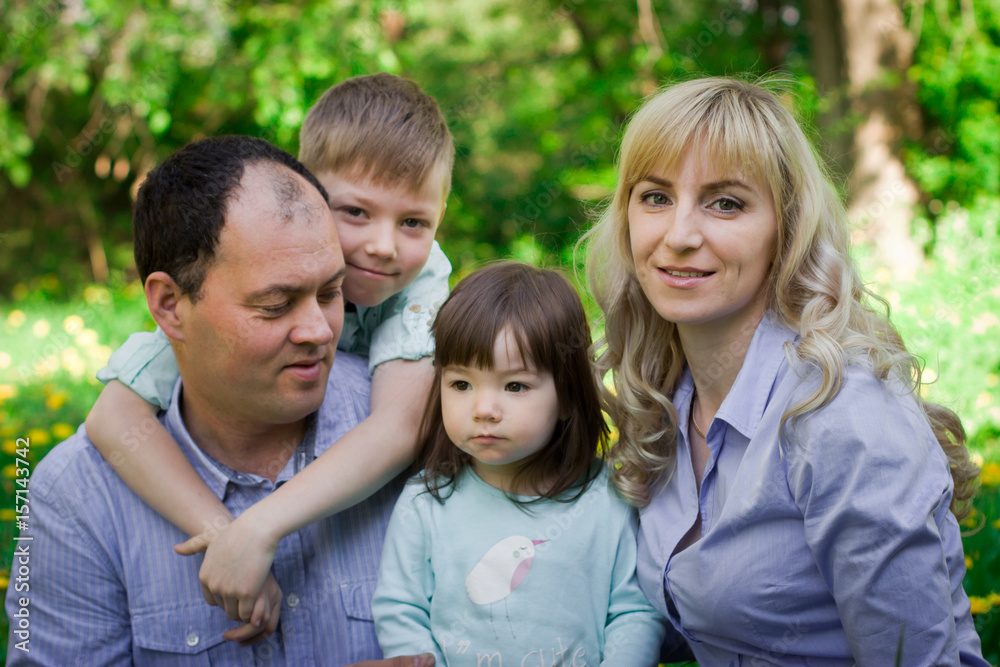 Family portrait in a spring park. Family portrait in a spring park.
