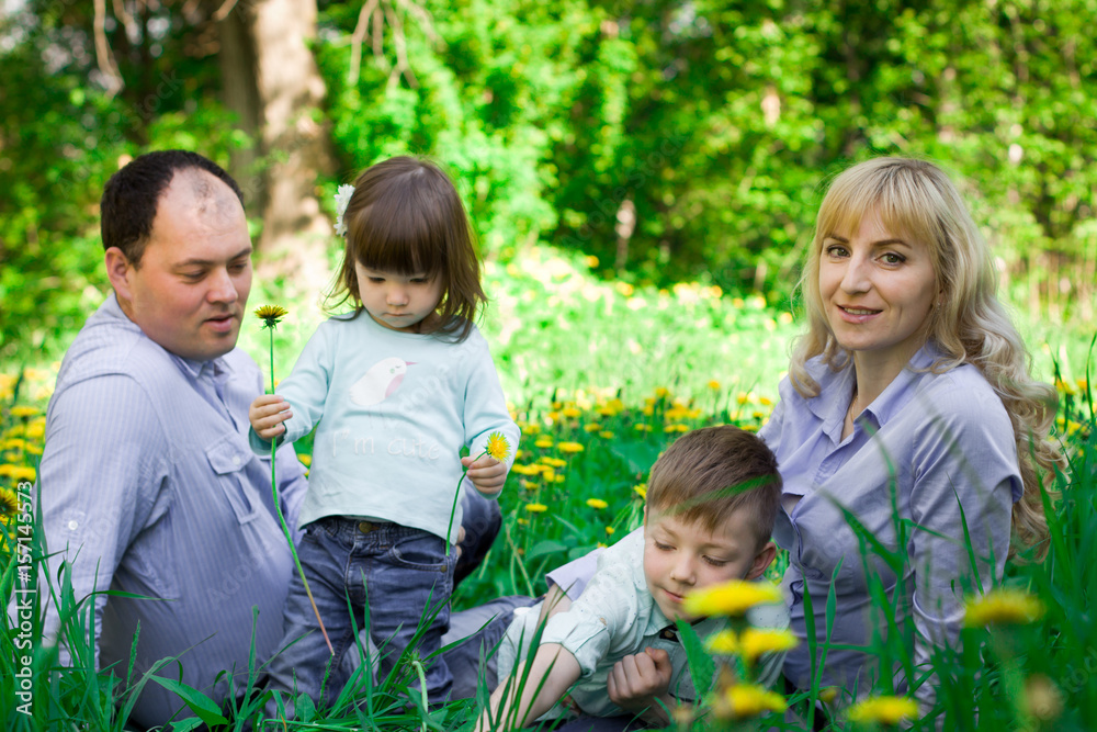 Family portrait in a spring park. Family portrait in a spring park.