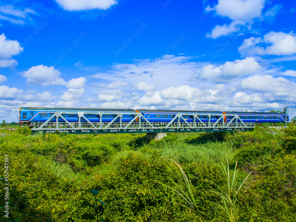 Diesel railcar set was passing steel bridge, 2016. (Taken form public road.)