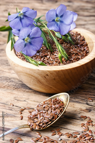 Linseed on wooden background