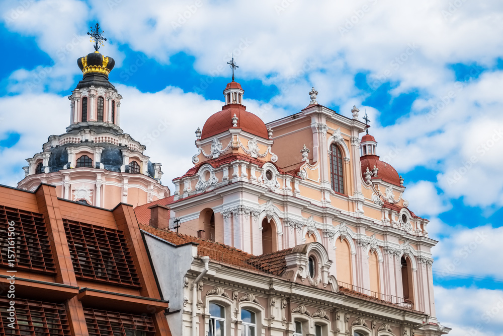 Roof and dome of St. Casimir Church with Golden crown of Jagiellons in old town of Vilnius city, Lithuania.