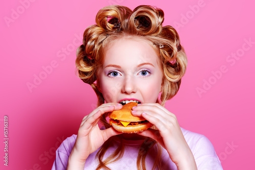 girl eating hamburger