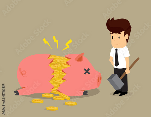 businessman smashed piggy bank