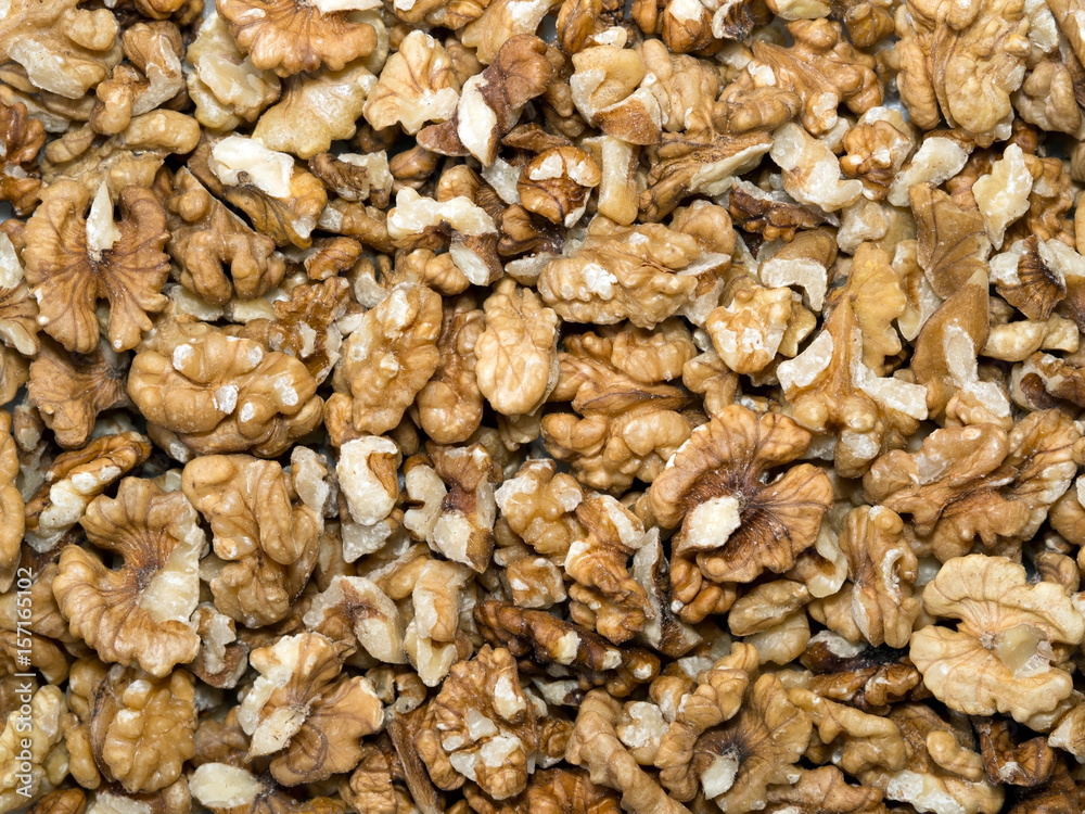 Peeled and crushed walnut closeup Peeled and crushed walnut closeup