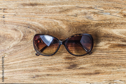 Glasses on wooden background