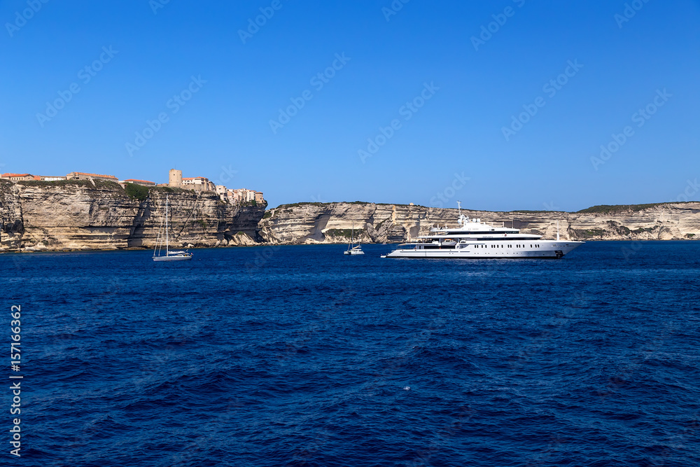 Bonifacio, France. Yachts against the backdrop of a picturesque rocky shore