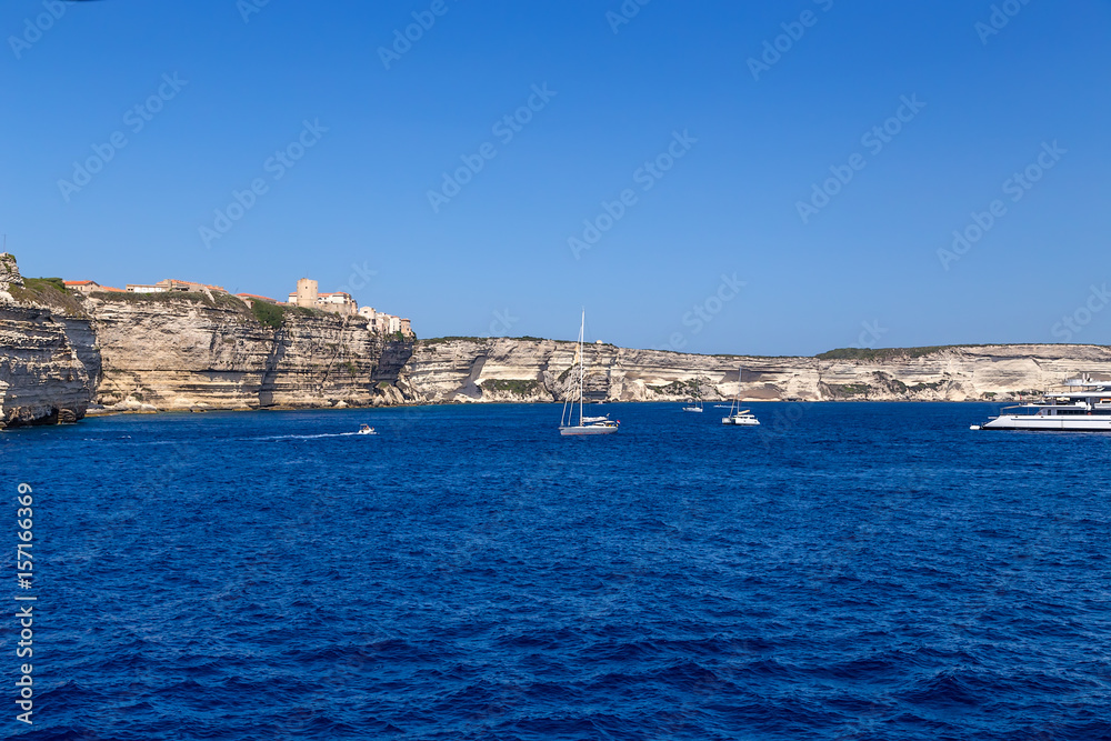 Bonifacio, France. Tourist vessels against the backdrop of a picturesque rocky shore