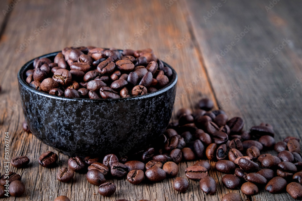 Coffee beans on wooden floor Popular drinks Coffee beans on wooden floor Popular drinks