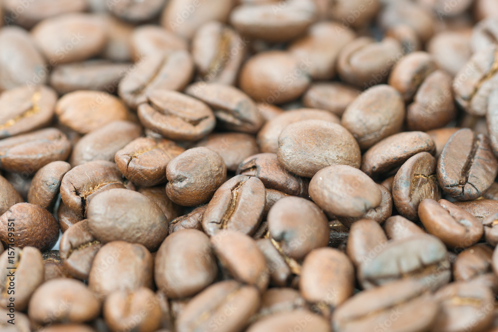 Brown coffee beans for background and texture. Brown coffee beans for background and texture.