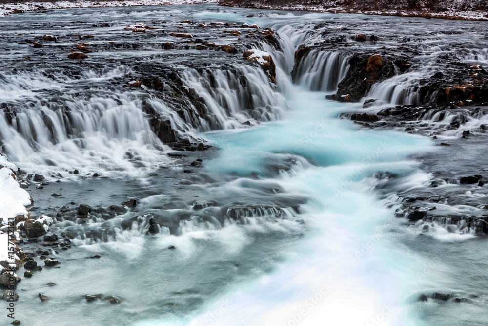 beautiful Bruarfoss waterfall with turquoise water beautiful Bruarfoss waterfall with turquoise water