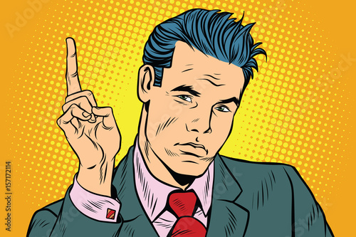 businessman pointing finger up