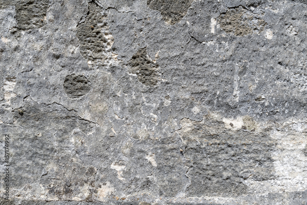 Weathered old sandstone wall background Weathered old sandstone wall background