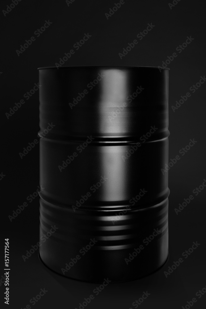 Black oil barrel on dark background Black oil barrel on dark background
