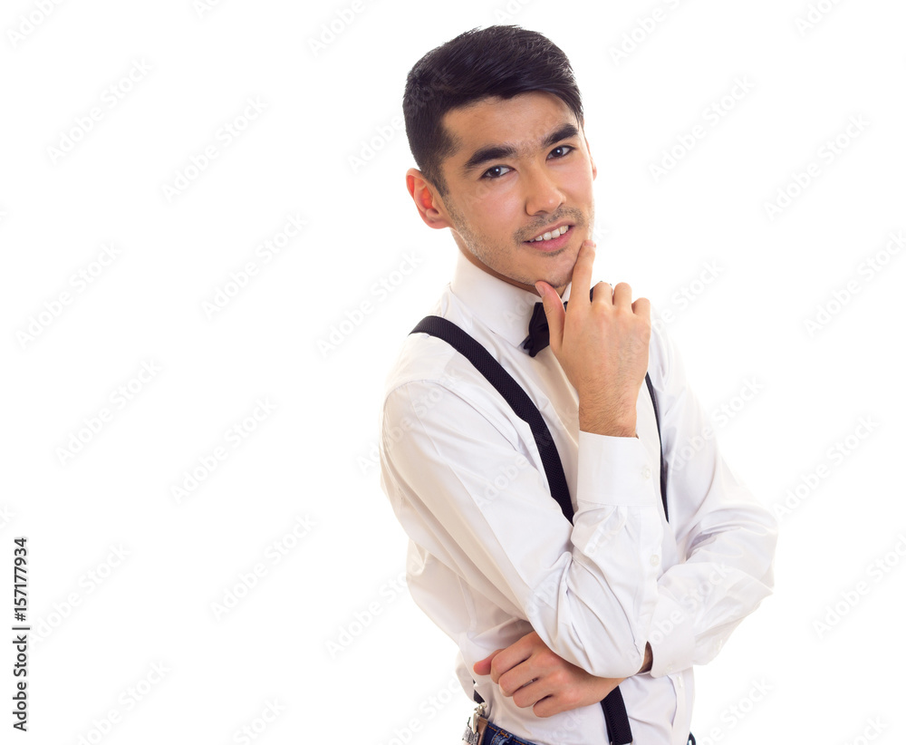 Young man with bow-tie and suspenders Young man with bow-tie and suspenders