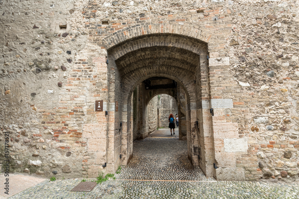 The entry to the castle Scaliger in old town Sirmione on lake Lago di Garda. Italy