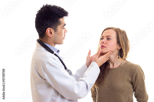 Doctor examing his patient