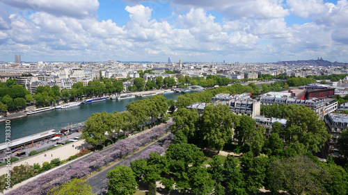 Aerial view of river Seine from Eiffel tower with beautiful scattered clouds, Paris, France © aerial-drone