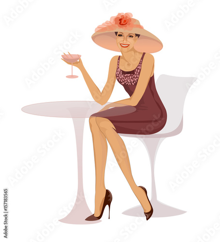 Woman with glass sitting at table