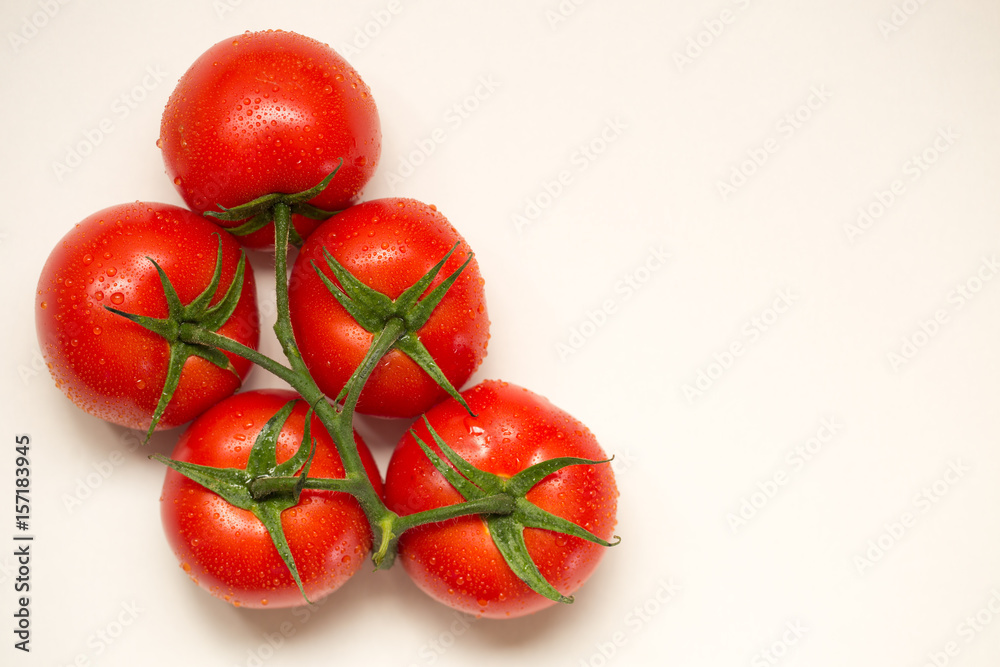 Red fresh tomatoes isolated on white background Red fresh tomatoes isolated on white background
