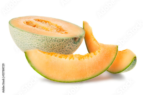 half of melon with slices isolated on white background
