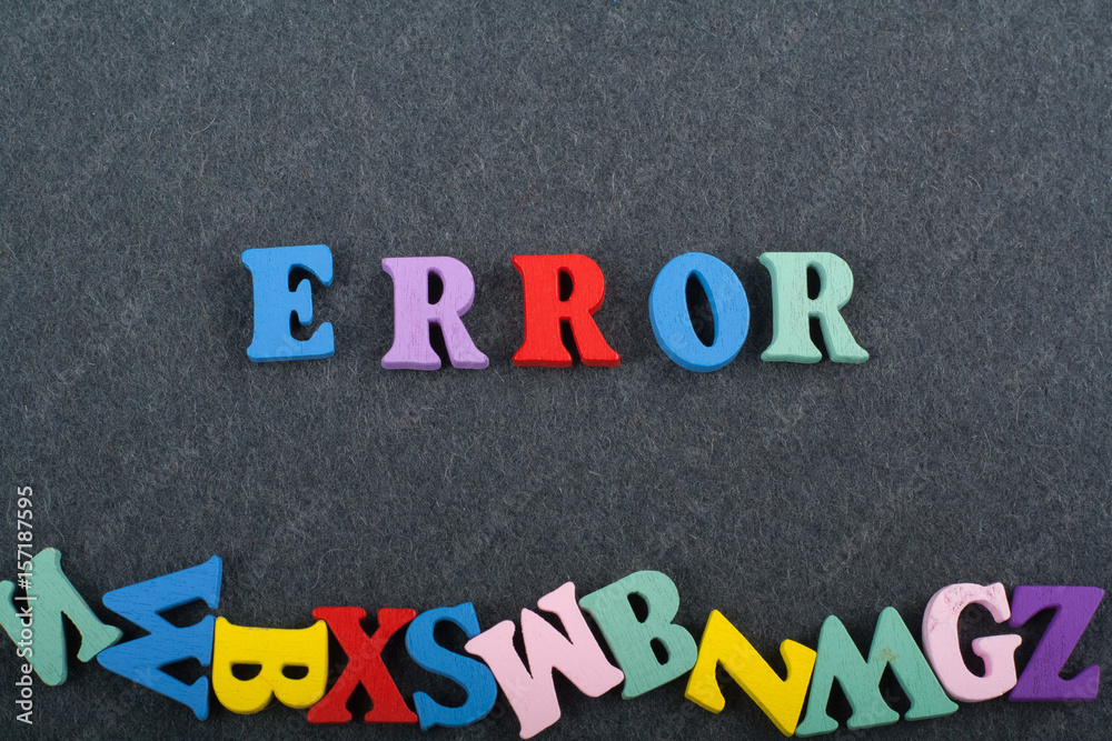 ERROR word on black board background composed from colorful abc alphabet block wooden letters, copy space for ad text. Learning english concept. ERROR word on black board background composed from colorful abc alphabet block wooden letters, copy space for ad text. Learning english concept.