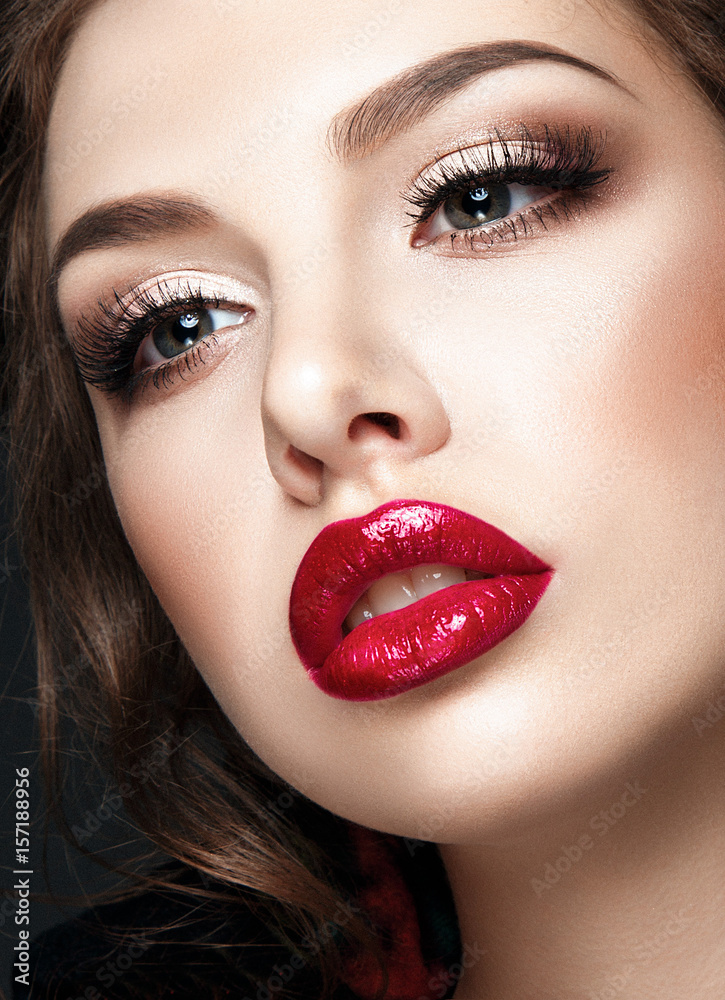Beautiful woman portrait closed up with red lips and glamour make up. 