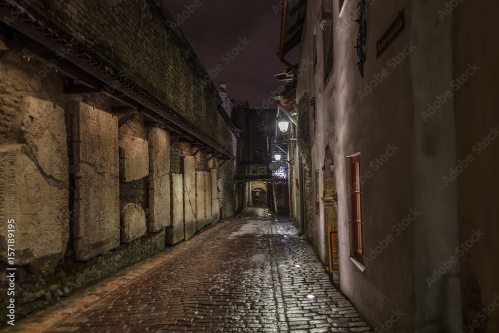 Medieval street at night. Historical center of Tallinn, Estonia,