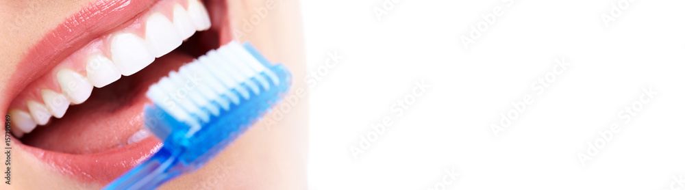 Obraz premium Teeth with toothbrush.