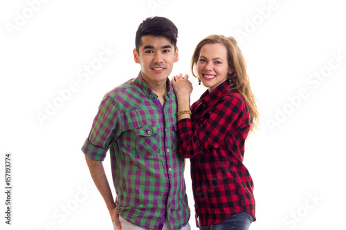 Young couple in plaid shirts