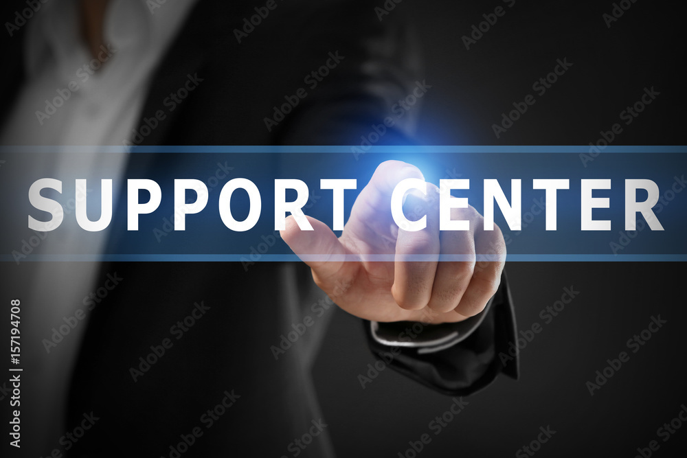 Male hand with finger pointing on dark background Male hand with finger pointing on dark background