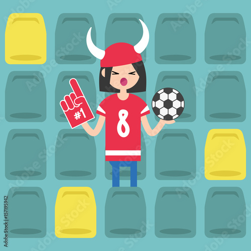 Young brunette girl wearing horned hat and foam finger at the stadium / flat editable vector illustration, clip art
