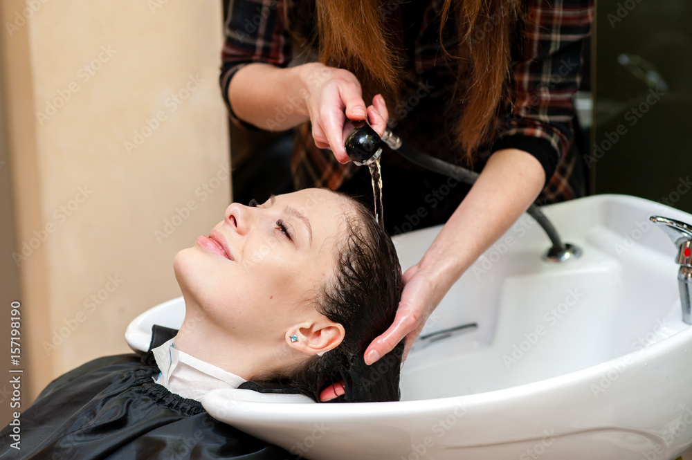 Beautiful girl washing their hair. Beautiful girl washing their hair.