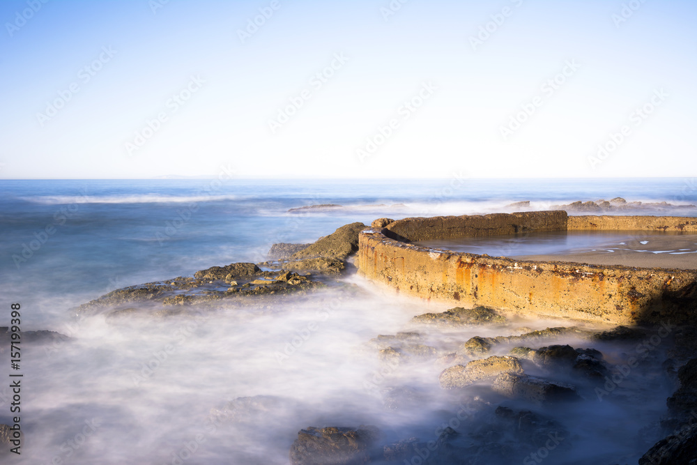 Sea wall protecting beach