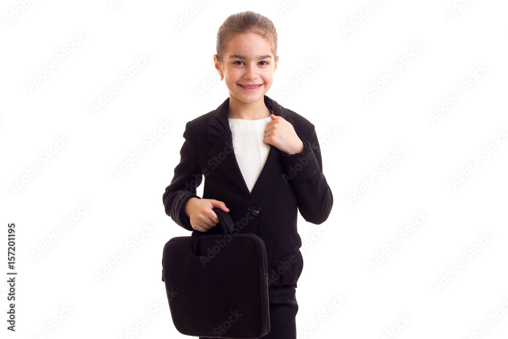 Little girl in black jacket holding diplomat Little girl in black jacket holding diplomat