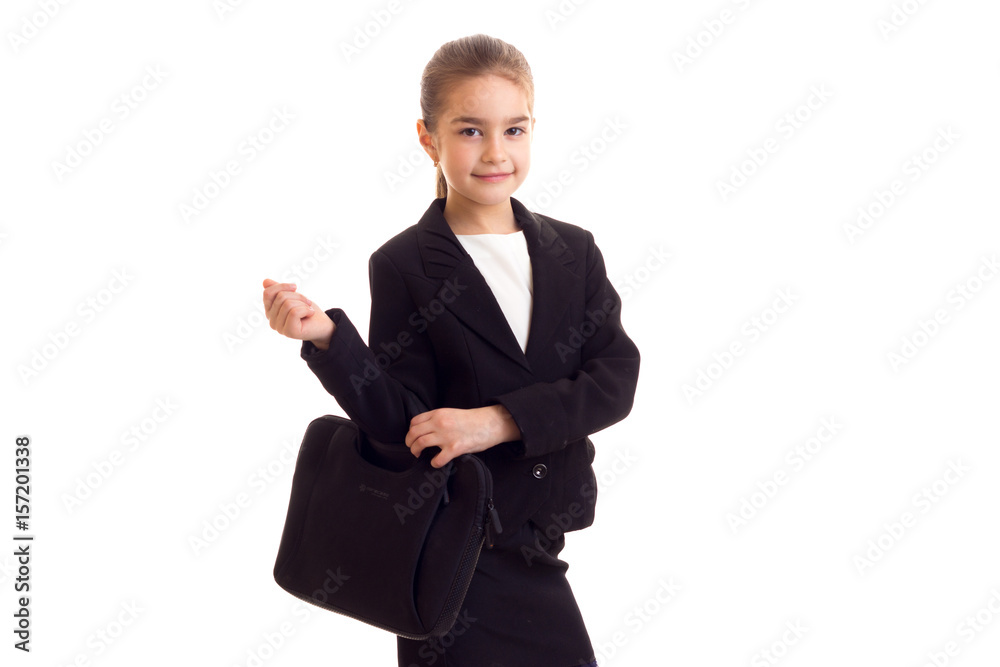 Little girl in black jacket holding diplomat Little girl in black jacket holding diplomat