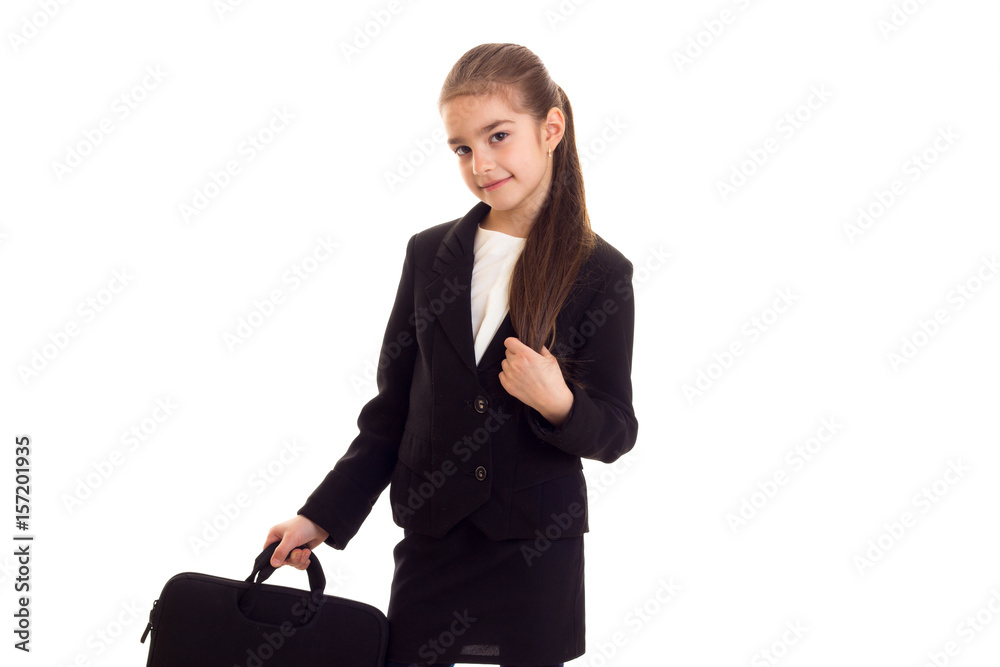 Little girl in black jacket holding diplomat Little girl in black jacket holding diplomat