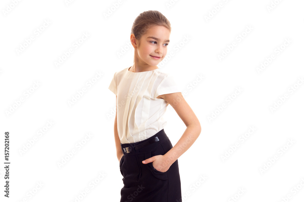 Little girl in white T-shirt and black skirt Little girl in white T-shirt and black skirt