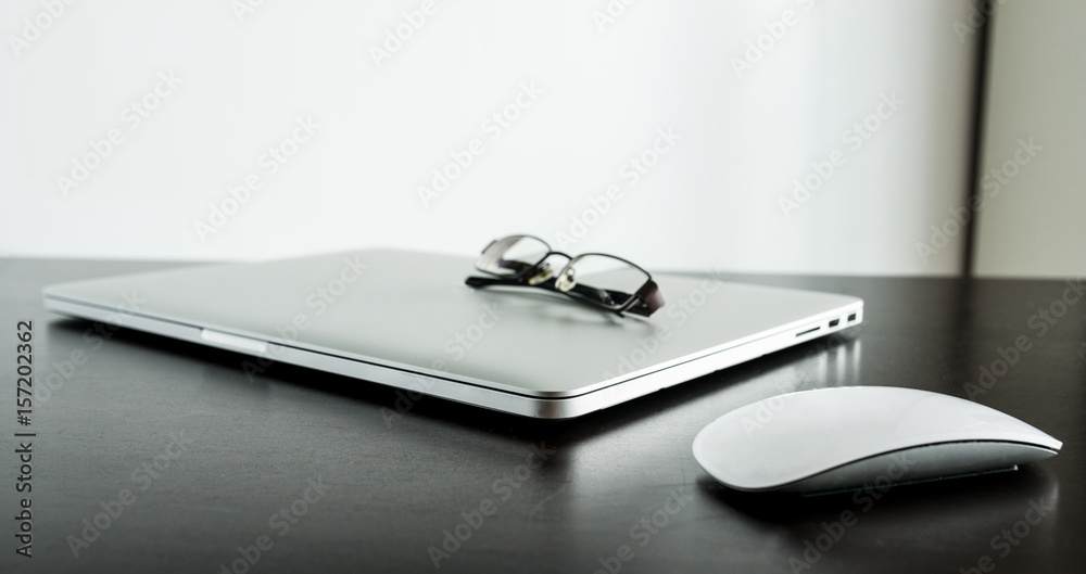 Laptop with glasses Laptop with glasses